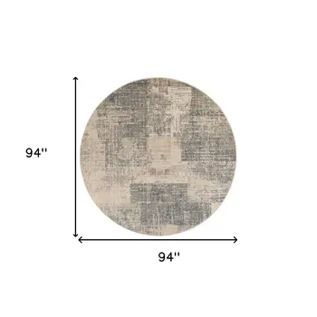 8' Gray and Light Blue Abstract Power Loom Round Rug