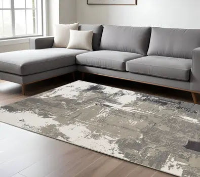 10' X 14' Ivory Black and Gray Abstract Power Loom Area Rug