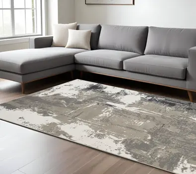 8' X 10' Ivory Black and Gray Abstract Power Loom Area Rug