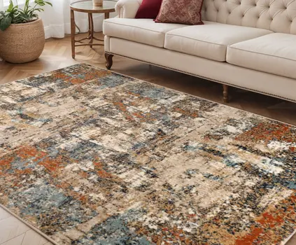 5' X 8' Tan Orange and Gray Abstract Power Loom Area Rug