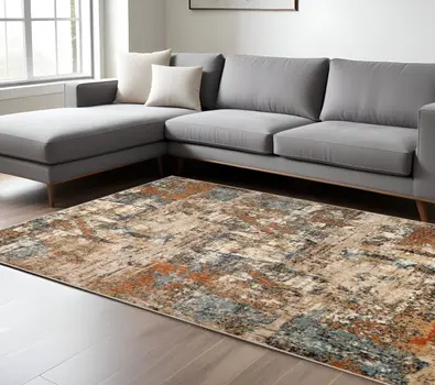 9' X 12' Tan Orange and Gray Abstract Power Loom Area Rug
