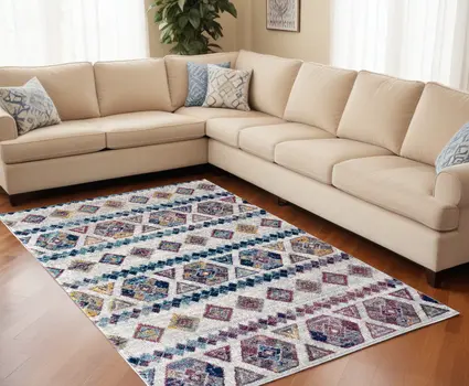 9' X 12' Ivory Blue and Orange Geometric Power Loom Area Rug