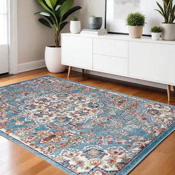 4' X 6' Ivory Blue and Orange Medallion Power Loom Area Rug
