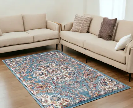 5' X 8' Ivory Blue and Orange Medallion Power Loom Area Rug