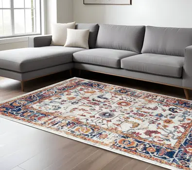 8' X 10' Ivory Navy and Orange Floral Power Loom Area Rug