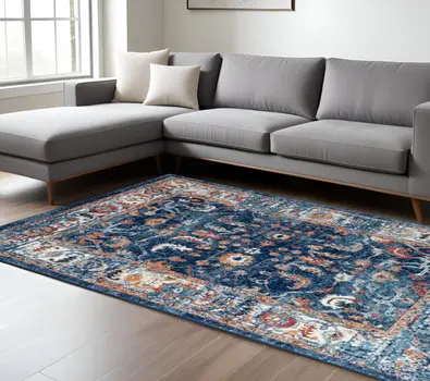 8' X 10' Blue Rust and Orange Floral Power Loom Area Rug