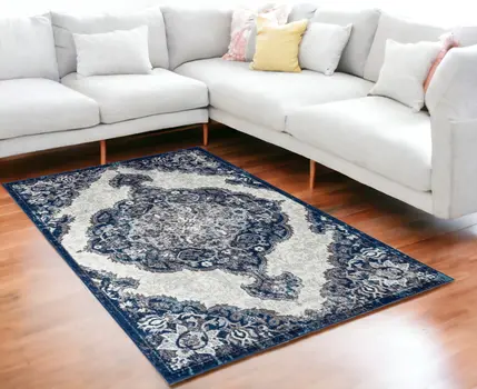5' X 8' Navy and Ivory Medallion Power Loom Area Rug