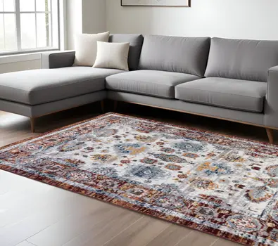 9' X 12' Ivory Brown and Orange Floral Power Loom Area Rug