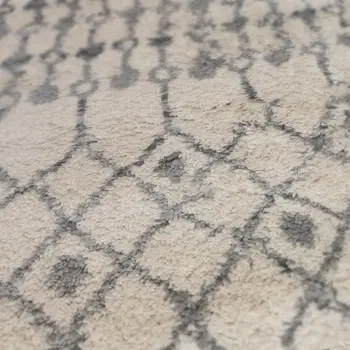 7' X 9' Gray And Ivory Geometric Shag Area Rug