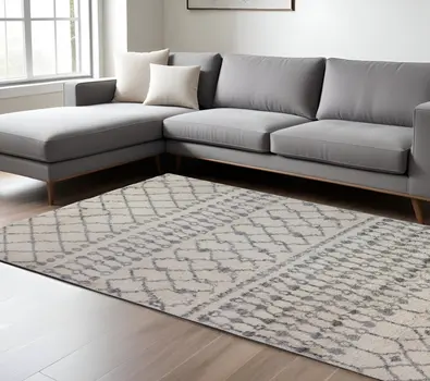 7' X 9' Gray And Ivory Geometric Shag Area Rug