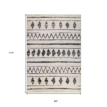 7' X 9' Black And Ivory Geometric Shag Area Rug