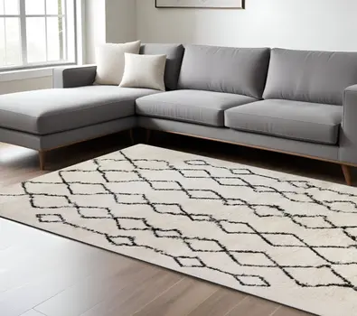 7' X 9' Black and Ivory Geometric Shag Area Rug