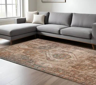 7' X 9' Beige Gray and Taupe Medallion Power Loom Area Rug