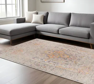 9' X 12' Ivory And Yellow Oriental Distressed Area Rug