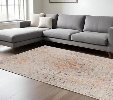 10' X 14' Ivory And Yellow Oriental Distressed Area Rug