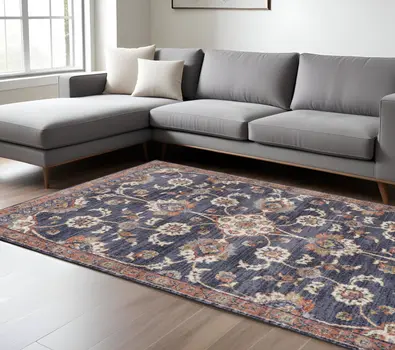 8' X 10' Ivory And Orange Floral Area Rug