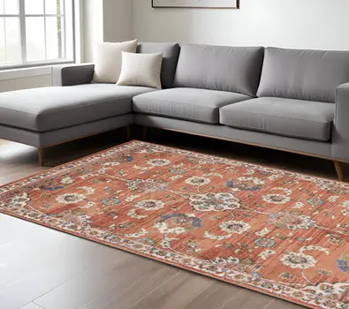 6' X 9' Ivory Blue And Orange Floral Area Rug