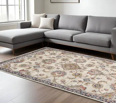 9' X 12' Ivory Tan And Blue Floral Area Rug