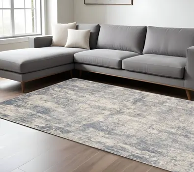 6' X 9' Light Gray And Blue Abstract Area Rug