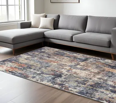 8' X 10' Ivory And Orange Abstract Area Rug