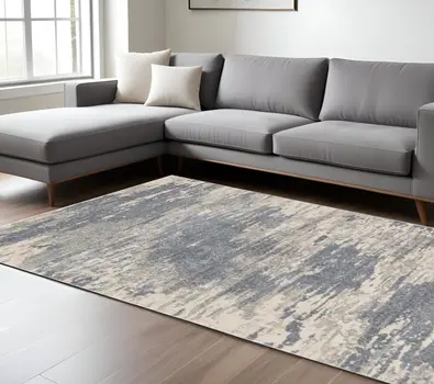 9' X 12' Ivory Blue And Gray Abstract Area Rug