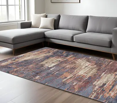 8' X 10' Ivory Rust And Blue Abstract Area Rug
