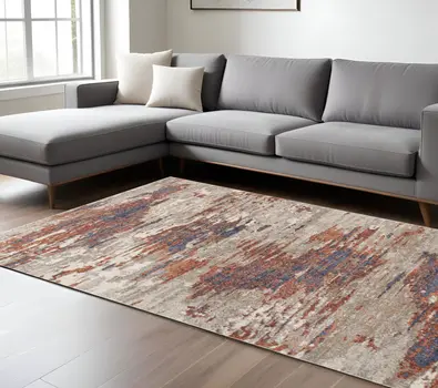 8' X 10' Beige Rust And Blue Abstract Area Rug