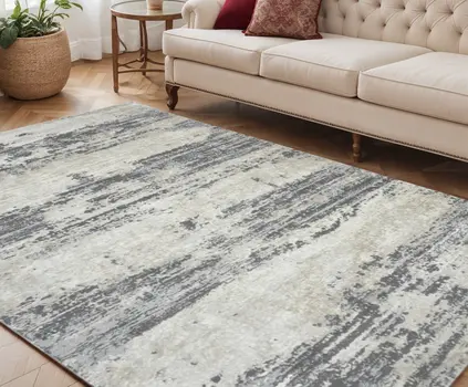 5' X 8' Ivory Beige And Gray Abstract Area Rug