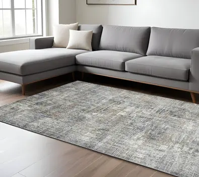 10' X 14' Ivory Gray And Orange Abstract Area Rug