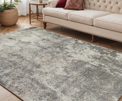 5' X 8' Beige Ivory And Gray Abstract Area Rug