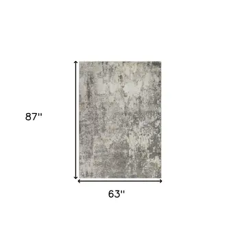 5' X 8' Beige Ivory And Gray Abstract Area Rug