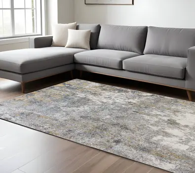 8' X 10' Ivory Blue And Yellow Abstract Area Rug