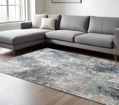 8' X 10' Ivory Blue and Gray Abstract Power Loom Area Rug