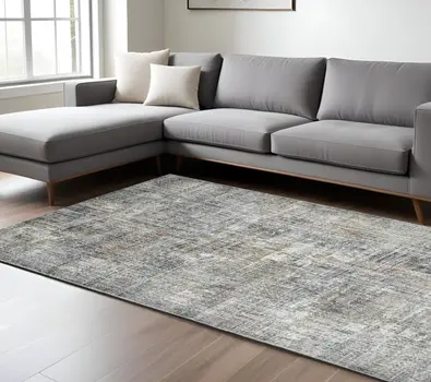 9' X 12' Ivory Gray And Orange Abstract Area Rug
