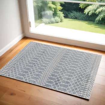 3' X 5' Blue and Ivory Abstract Power Loom Washable Area Rug