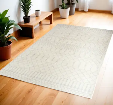 4' X 6' Blue and Ivory Abstract Power Loom Washable Area Rug