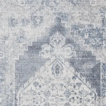 5' X 7' Blue and Ivory Abstract Power Loom Washable Area Rug