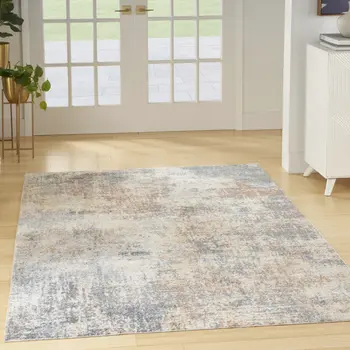 7' X 9' Blue and Ivory Abstract Power Loom Washable Area Rug