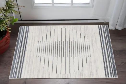 3' X 5' Ivory And Blue Geometric Washable Area Rug