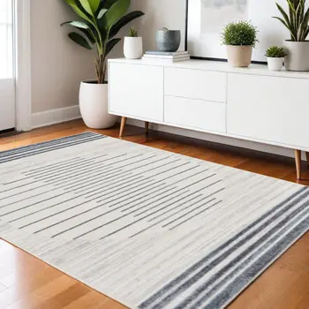 4' X 6' Ivory And Blue Geometric Washable Area Rug