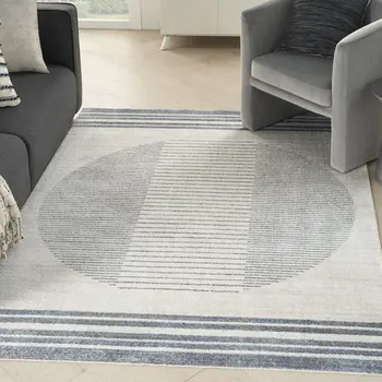 5' X 7' Blue And Ivory Geometric Washable Area Rug