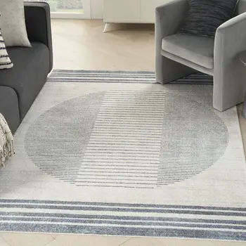 5' X 7' Blue And Ivory Geometric Washable Area Rug