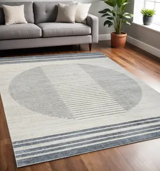 5' X 7' Blue And Ivory Geometric Washable Area Rug