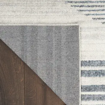 5' X 7' Blue And Ivory Geometric Washable Area Rug