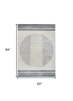 5' X 7' Blue And Ivory Geometric Washable Area Rug