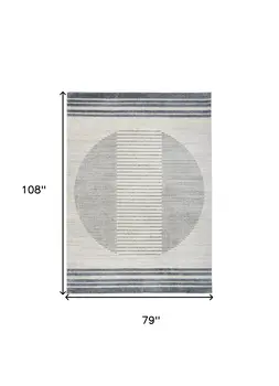 7' X 9' Blue And Ivory Geometric Washable Area Rug