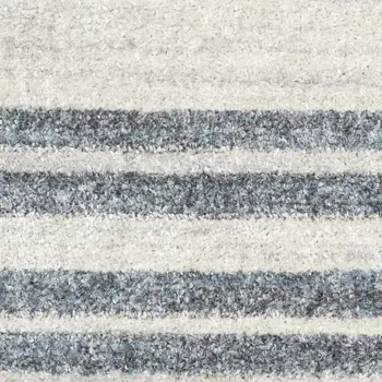 7' X 9' Blue And Ivory Geometric Washable Area Rug