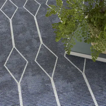 5' X 7' Blue and Ivory Geometric Power Loom Washable Area Rug