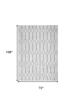 6' X 9' Gray and Ivory Geometric Power Loom Distressed Washable Area Rug
