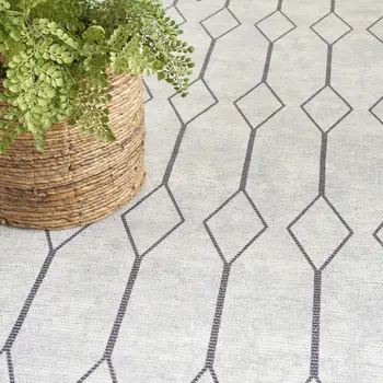 6' X 9' Gray and Ivory Geometric Power Loom Distressed Washable Area Rug